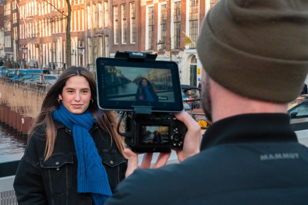 Reporting crew scouting a filming location outdoors