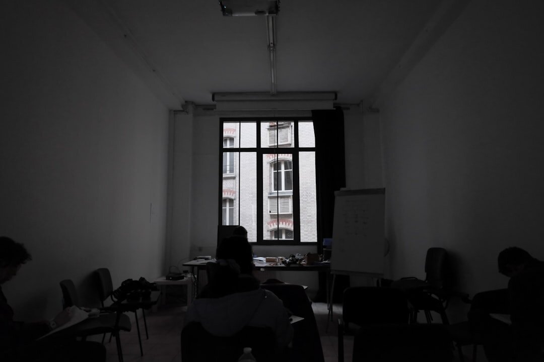 Two people practicing an interview in a training room