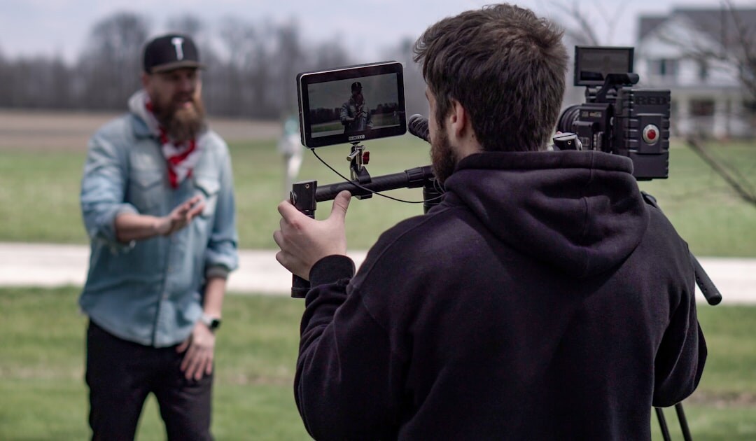 Reporter interviewing a person outdoors with a microphone