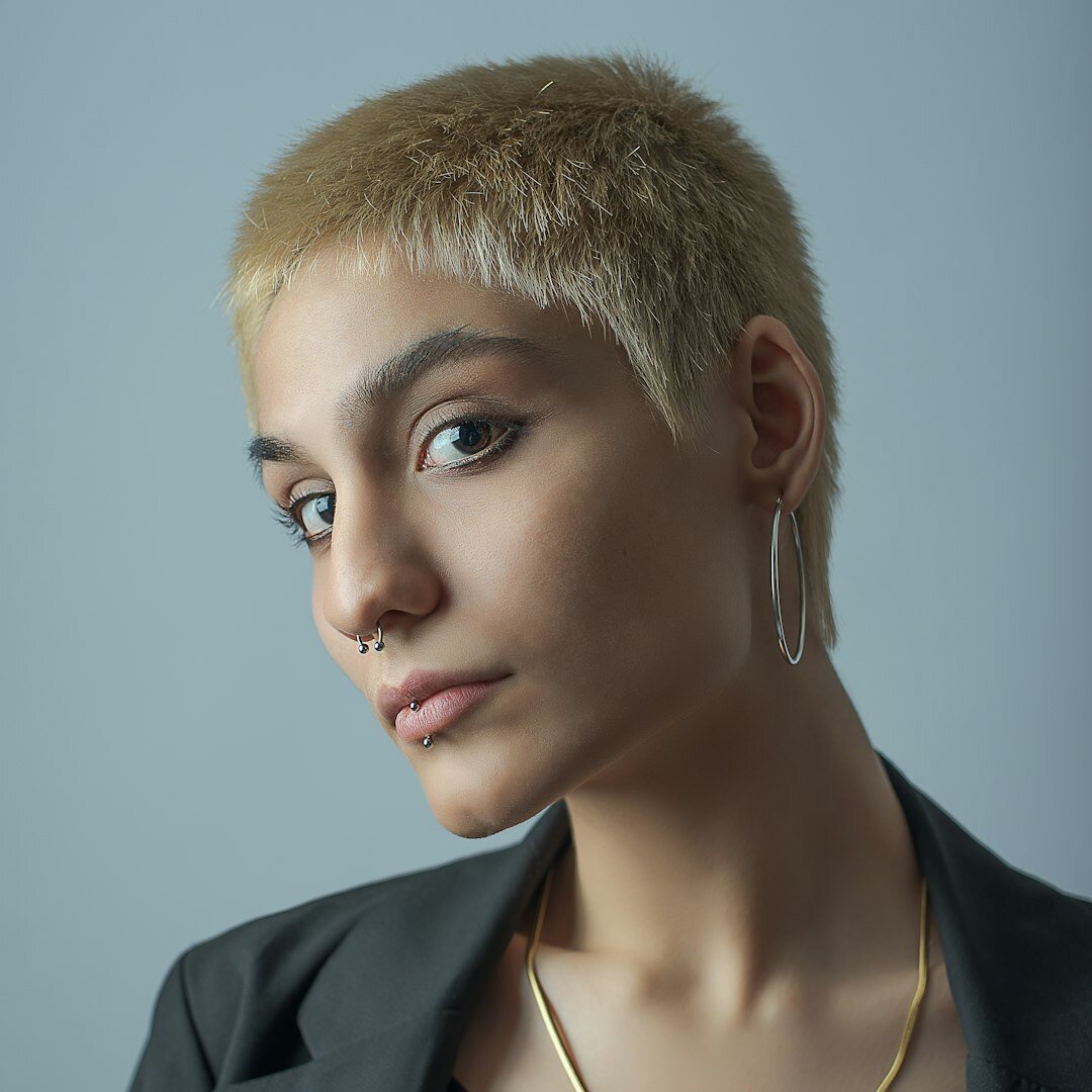 Portrait of a woman with short hair smiling